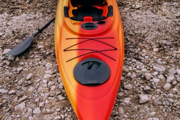 a train that is sitting on a rock